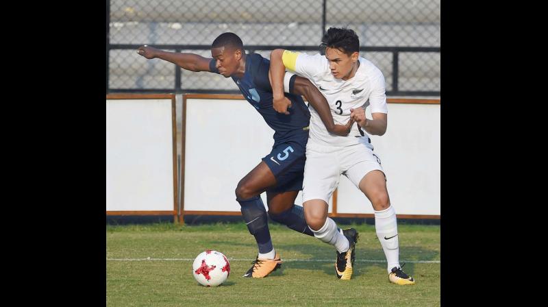 England and New Zealand players in action at a warm-up match in Mumbai on Sunday, ahead of the Under-17 World Cup. England won 3-2 (Photo: PTI) England and New Zealand players in action at a warm-up match in Mumbai on Sunday, ahead of the Under-17 World Cup. England won 3-2 (Photo: PTI)