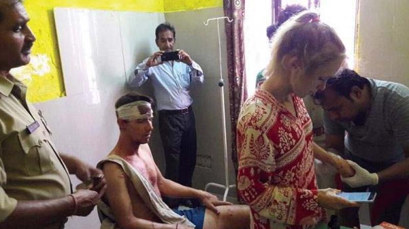 The couple from Lausanne in Switzerland was chased and attacked on Sunday with stones and sticks by a group of youth in the tourist town of Fatehpur Sikri, about 40 km from Agra. (Photo: Twitter | @ANINewsUP) The couple from Lausanne in Switzerland was chased and attacked on Sunday with stones and sticks by a group of youth in the tourist town of Fatehpur Sikri, about 40 km from Agra. (Photo: Twitter | @ANINewsUP)