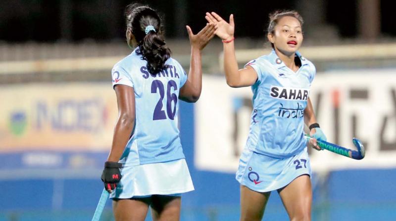 Sushila Chanu (right) and Sunita celebrate India’s 4-2 win over Japan in the women’s Asian Cup semi-final. Sushila Chanu (right) and Sunita celebrate India’s 4-2 win over Japan in the women’s Asian Cup semi-final.