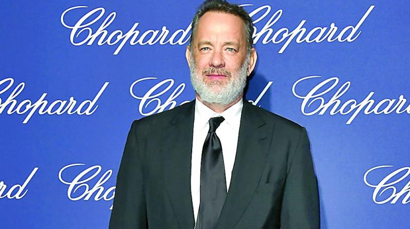 Tom Hanks was at a talk about his new book, Uncommon Type: Some Stories, and at the end of the event, had a question-and-answer session. Tom Hanks was at a talk about his new book, Uncommon Type: Some Stories, and at the end of the event, had a question-and-answer session.
