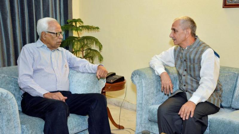 Dineshwar Sharma, the Centre's special representative for talks on Kashmir, calls on J-K governor NN Vohra in New Delhi on Sunday. (Photo: PTI) Dineshwar Sharma, the Centre's special representative for talks on Kashmir, calls on J-K governor NN Vohra in New Delhi on Sunday. (Photo: PTI)