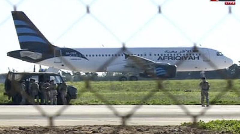 In this frame grab taken from television a hijacked Afriqiyah Airways A320 sits on the tarmac at Malta International airport. (Photo: AP) In this frame grab taken from television a hijacked Afriqiyah Airways A320 sits on the tarmac at Malta International airport. (Photo: AP)