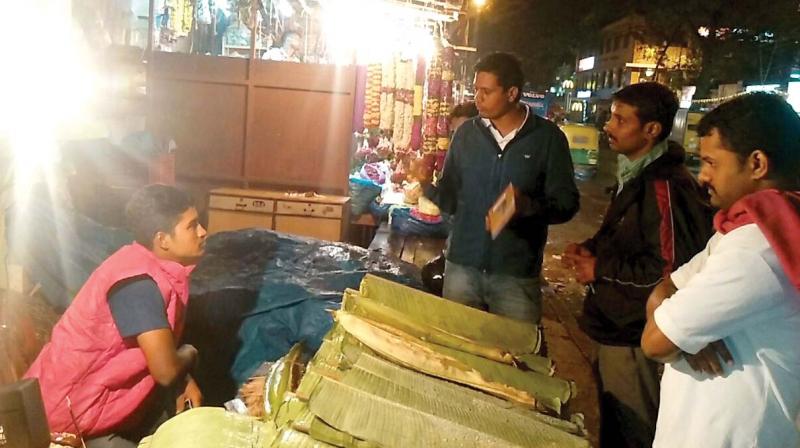 Members of NGO Kartavya conducting a survey among the vendors of Malleswaram market Members of NGO Kartavya conducting a survey among the vendors of Malleswaram market