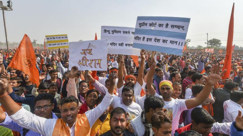 Supporters participate in 'Dharam Sabha', being organised by the Vishwa Hindu Parishad to push for the construction of Ram temple on Sunday. (Photo: PTI) Supporters participate in 'Dharam Sabha', being organised by the Vishwa Hindu Parishad to push for the construction of Ram temple on Sunday. (Photo: PTI)