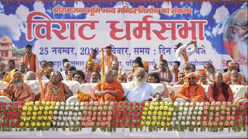 Seers from different ashrams gather at the programme venue as they participate in Dharam Sabha, organised by the VHP. (Photo: PTI) Seers from different ashrams gather at the programme venue as they participate in Dharam Sabha, organised by the VHP. (Photo: PTI)