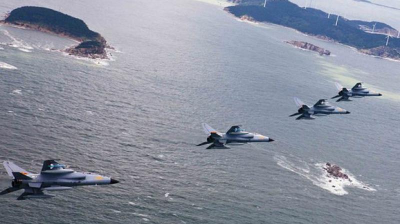 In a statement, the air force said H-6K bombers and Su-30 and Su-35 fighters, among other aircraft, carried out combat patrols over the South China Sea and exercises in the Western Pacific. (Photo: AFP/Representational) In a statement, the air force said H-6K bombers and Su-30 and Su-35 fighters, among other aircraft, carried out combat patrols over the South China Sea and exercises in the Western Pacific. (Photo: AFP/Representational)