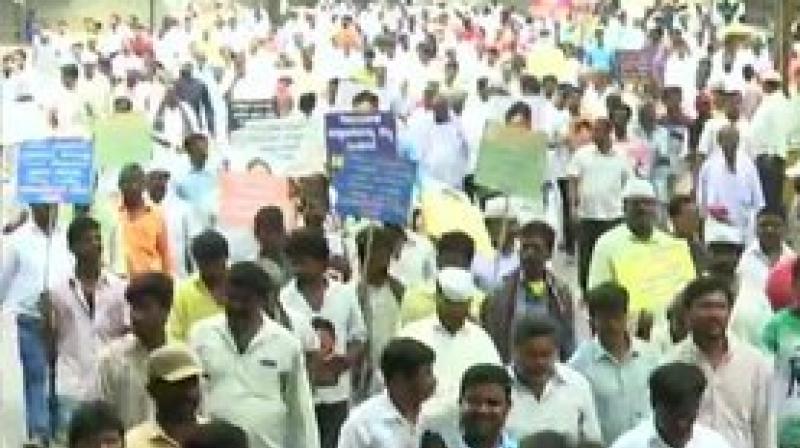 The protesters poured into the city from different parts of the State, particularly the Vokkaliga stronghold of Old Mysuru region, in respose to "Raj Bhavan Chalo" call given by various outfits of the community. (Photo: ANI) The protesters poured into the city from different parts of the State, particularly the Vokkaliga stronghold of Old Mysuru region, in respose to "Raj Bhavan Chalo" call given by various outfits of the community. (Photo: ANI)