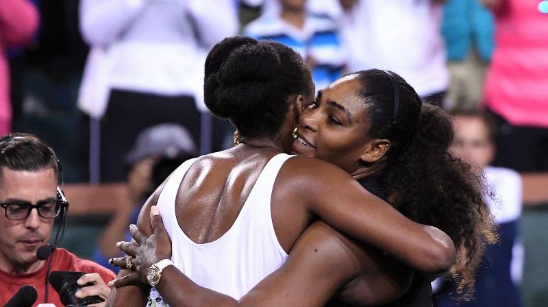 Venus Williams (white) defeated younger sister Serena Williams 6-3, 6-4 in the third round of the BNP Paribas Open. (Photo: AP) Venus Williams (white) defeated younger sister Serena Williams 6-3, 6-4 in the third round of the BNP Paribas Open. (Photo: AP)