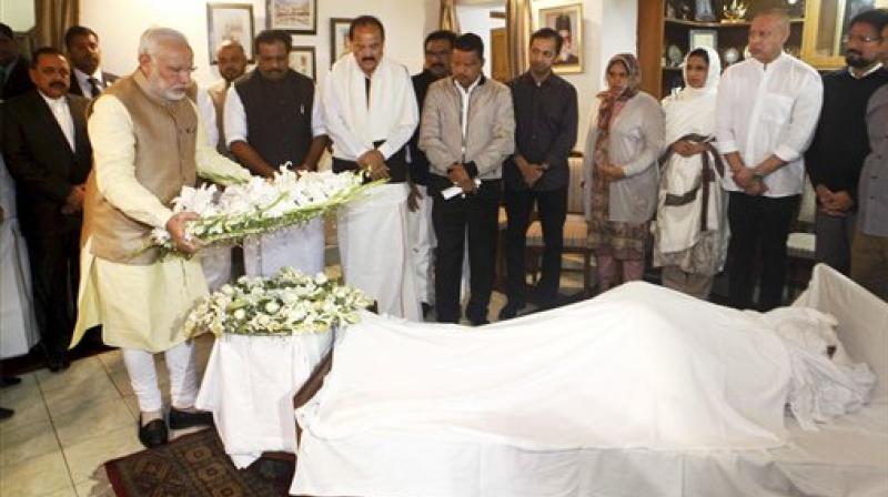 Prime Minister Narendra Modi paying his last respects to IUML MP from Kerala E Ahamed at his residence in New Delhi on Wednesday. (Photo: PTI) Prime Minister Narendra Modi paying his last respects to IUML MP from Kerala E Ahamed at his residence in New Delhi on Wednesday. (Photo: PTI)