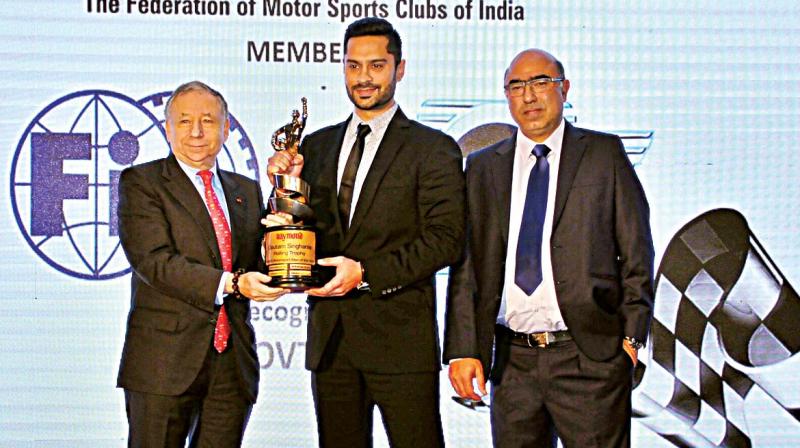 President of FIA John Todt (left) and FMSCI President Akbar Ebrahim present Gaurav Gill with the Motorsports Person 2016 award at the FMSCI awards function (Photo: DC) President of FIA John Todt (left) and FMSCI President Akbar Ebrahim present Gaurav Gill with the Motorsports Person 2016 award at the FMSCI awards function (Photo: DC)
