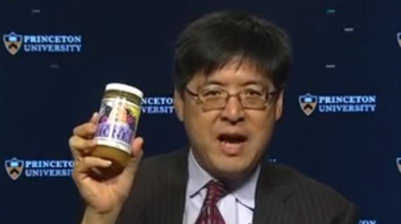 He ate from a can of gourmet-style crickets and added in some honey. (Photo: YouTube) He ate from a can of gourmet-style crickets and added in some honey. (Photo: YouTube)
