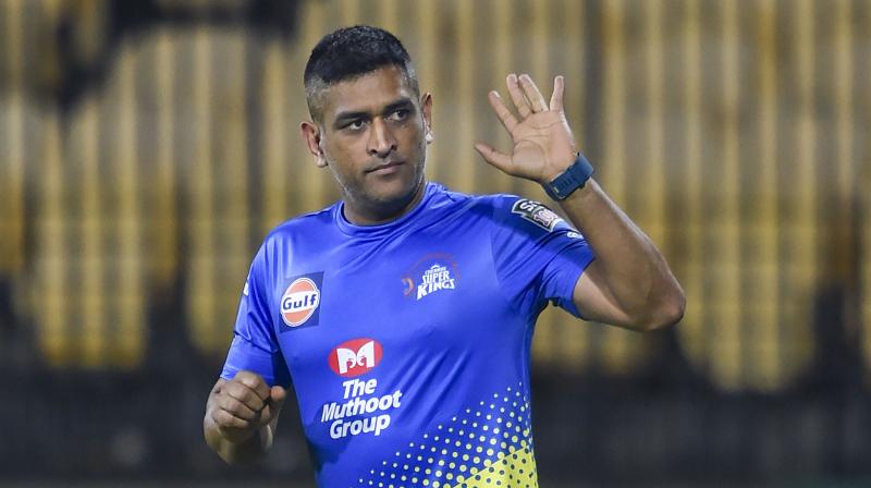 MS Dhoni waves to his fans during Chennai Super Kings first net session on Monday. PTI Photo