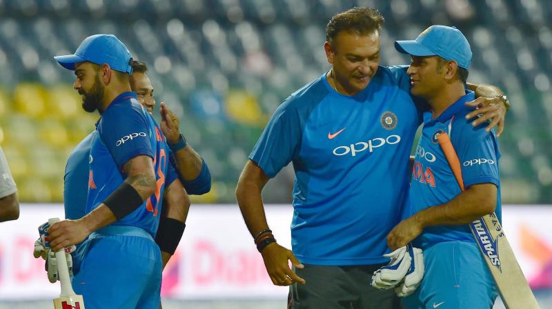 While captain Virat Kohli has always been stood firm in his predecessor’s support, Team India head coach Ravi Shastri too has not missed a chance to wholeheartedly praise India’s World Cup-winning skipper MS Dhoni. (Photo: PTI) While captain Virat Kohli has always been stood firm in his predecessor’s support, Team India head coach Ravi Shastri too has not missed a chance to wholeheartedly praise India’s World Cup-winning skipper MS Dhoni. (Photo: PTI)