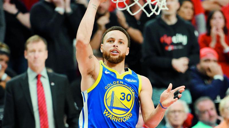 Stephen Curry of the Golden State Warriors shoots against the Portland Trail Blazers in Game Four of the NBA Western Conference Finals at Moda Center in Portland, Oregon on Tuesday. (Photo: AFP) Stephen Curry of the Golden State Warriors shoots against the Portland Trail Blazers in Game Four of the NBA Western Conference Finals at Moda Center in Portland, Oregon on Tuesday. (Photo: AFP)