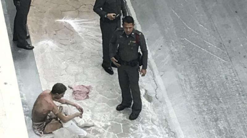 The unidentified man doused himself with gasoline before lighting himself on fire outside the gate of the embassy around noon, police said. (Photo: AP) The unidentified man doused himself with gasoline before lighting himself on fire outside the gate of the embassy around noon, police said. (Photo: AP)