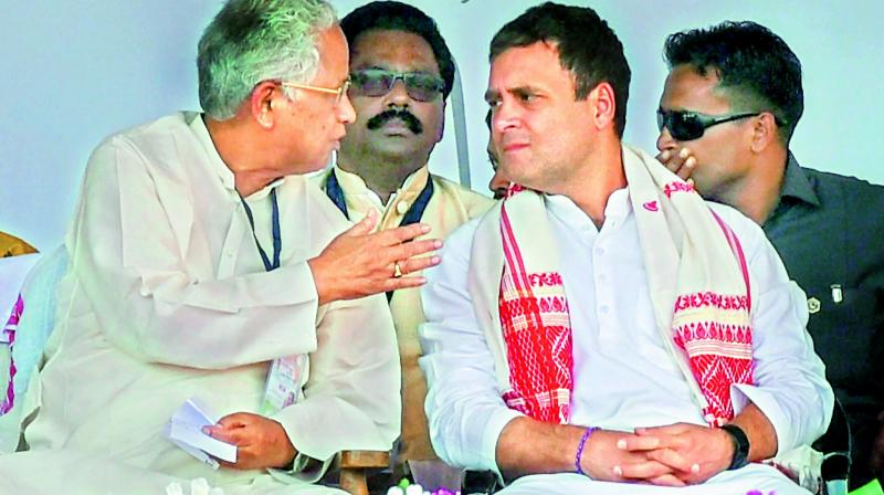 Congress President Rahul Gandhi and former Assam chief minister Tarun Gogoi during a public rally at Bokakhat, in Golaghat district on Wednesday. (Photo: PTI) Congress President Rahul Gandhi and former Assam chief minister Tarun Gogoi during a public rally at Bokakhat, in Golaghat district on Wednesday. (Photo: PTI)