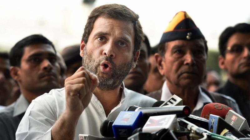 Congress Vice President Rahul Gandhi addressing the media after a meeting with several ex-servicemen at party headquarters in New Delhi. (Photo: PTI) Congress Vice President Rahul Gandhi addressing the media after a meeting with several ex-servicemen at party headquarters in New Delhi. (Photo: PTI)