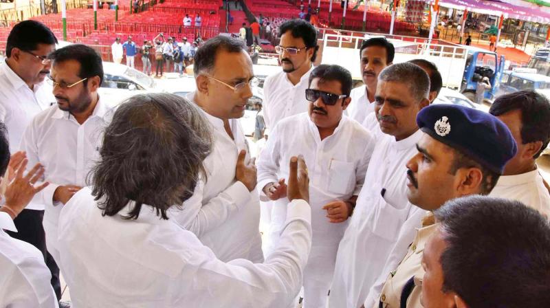 KPCC president Dinesh Gundurao inspects the preparations for Congress president Rahul Gandhi’s rally in Haveri, on Friday KPCC president Dinesh Gundurao inspects the preparations for Congress president Rahul Gandhi’s rally in Haveri, on Friday