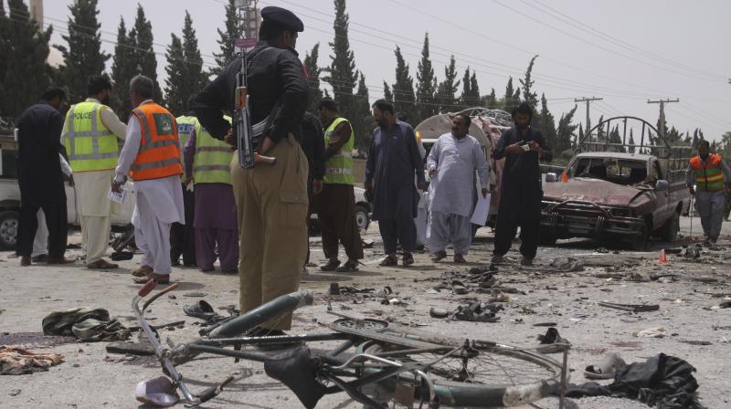 Pakistani security personnel visit the site of bombing in Quetta, Pakistan. (Photo: AP) Pakistani security personnel visit the site of bombing in Quetta, Pakistan. (Photo: AP)