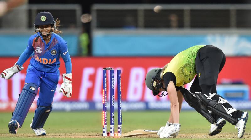 Wrist spinner Poonam Yadav returned with a four-wicket haul as India outwitted Australia by 17 runs in the opening match to make a resounding start to the Womens T20 World Cup here on Friday. (Photo:AFP)