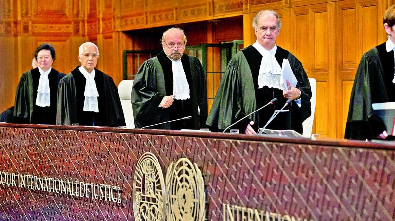 Judges enter to read the world court’s verdict in Jadhav’s case, in The Hague, Netherlands on Thursday. Judges enter to read the world court’s verdict in Jadhav’s case, in The Hague, Netherlands on Thursday.