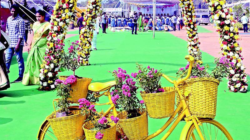 A flower decoration greets visitors to the rose show at Swaraj Maidan in Vijayawada on Friday. (Photo: Dc) A flower decoration greets visitors to the rose show at Swaraj Maidan in Vijayawada on Friday. (Photo: Dc)