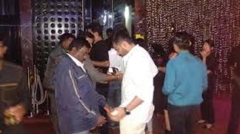 A file photo of the police carrying out a raid at a city pub. A file photo of the police carrying out a raid at a city pub.