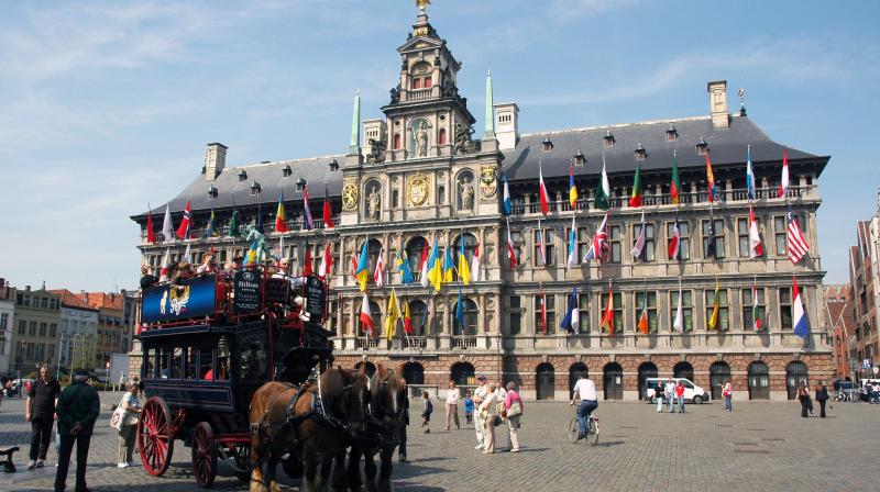 One can journey on to the Grote Markt square where one can find the spectacular Antwerp Town Hall and the impressive Brabo Fountain. One can journey on to the Grote Markt square where one can find the spectacular Antwerp Town Hall and the impressive Brabo Fountain.