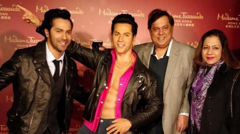Varun Dhawan with family at Madame Tussauds Hong Kong. Varun Dhawan with family at Madame Tussauds Hong Kong.