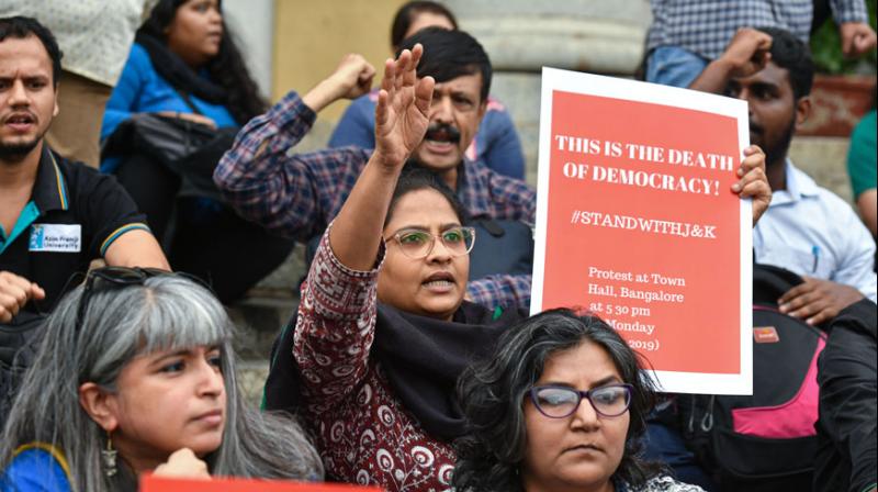 The Madhya Pradesh Police has booked a local Communist Party of India (Marxist) leader for selling a booklet titled 'Dhara 370 - Setu Ya Surang' at a protest here. (Photo: PTI) The Madhya Pradesh Police has booked a local Communist Party of India (Marxist) leader for selling a booklet titled 'Dhara 370 - Setu Ya Surang' at a protest here. (Photo: PTI)