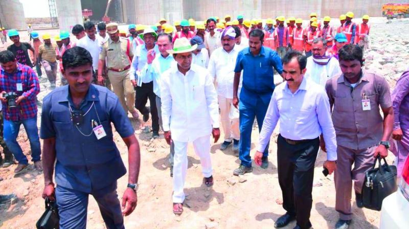 Chief Minister K. Chandrasekhar Rao (C) inspects the works of Kaleshwaram Lift Irrigation Project in Jayashankar Bhupalpally district on Sunday. Chief Minister K. Chandrasekhar Rao (C) inspects the works of Kaleshwaram Lift Irrigation Project in Jayashankar Bhupalpally district on Sunday.