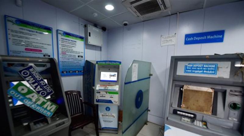 The waiver is applicable on transactions done at ATMs from November 10 till December 30, 2016. (Photo: PTI) The waiver is applicable on transactions done at ATMs from November 10 till December 30, 2016. (Photo: PTI)
