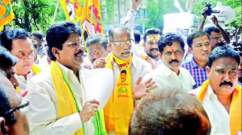 Telangana TD activists protest in front of Hyderabad district collectorate on Friday, demanding withdrawal of the non-bailable warrant issued on AP Chief Minister N. Chandrababu Naidu and a few other leaders in Babli. Telangana TD activists protest in front of Hyderabad district collectorate on Friday, demanding withdrawal of the non-bailable warrant issued on AP Chief Minister N. Chandrababu Naidu and a few other leaders in Babli.