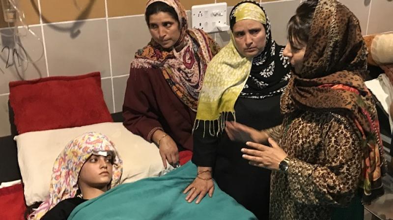 Chief Minister, Mehbooba Mufti, who has appealed for calm had on Wednesday evening, visited one of the injured students at Srinagar’s SMHS hospital. (Photo: DC) Chief Minister, Mehbooba Mufti, who has appealed for calm had on Wednesday evening, visited one of the injured students at Srinagar’s SMHS hospital. (Photo: DC)