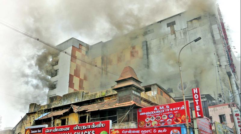 Fire which broke out at the Chennai Silks' garment showroom on South Usman Road in T Nagar on Wednesday morning, refused to die down until late evening. Fire which broke out at the Chennai Silks' garment showroom on South Usman Road in T Nagar on Wednesday morning, refused to die down until late evening.