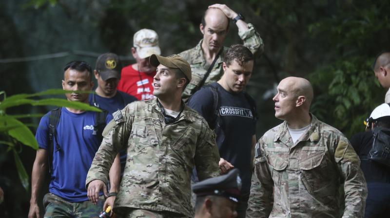 A team of American military personnel from the US Pacific Command, including pararescue and survival specialists, arrived at the site overnight to help rescue operations. (Photo: AP) A team of American military personnel from the US Pacific Command, including pararescue and survival specialists, arrived at the site overnight to help rescue operations. (Photo: AP)