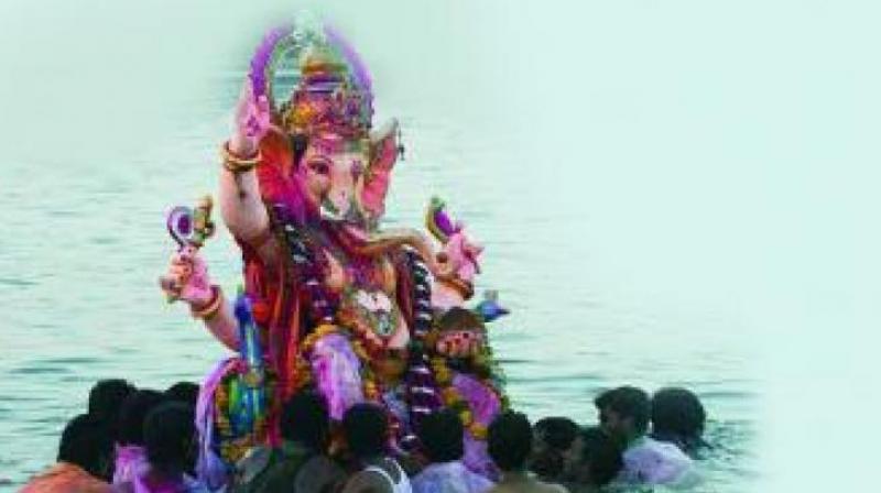PoP idols have gained favour over the last few decades, the glamour of large, brightly painted, waterproof idols has taken over the celebrations. (Representational image) PoP idols have gained favour over the last few decades, the glamour of large, brightly painted, waterproof idols has taken over the celebrations. (Representational image)