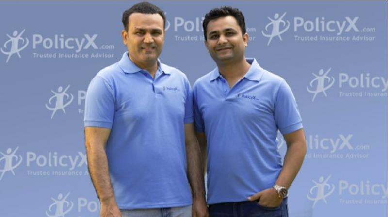 Cricketer Virender Sehwag with Naval Goel, CEO and Founder of PolicyX.com Cricketer Virender Sehwag with Naval Goel, CEO and Founder of PolicyX.com
