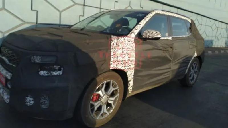 Kia SP2i compact SUV spied testing; interior photographed for the first time. Kia SP2i compact SUV spied testing; interior photographed for the first time.