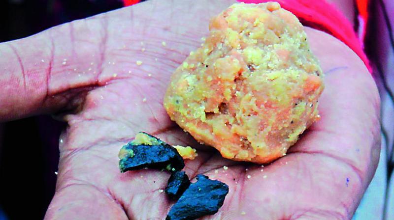 After nut, bolt, key chain, and panparag covers, it is the turn of coal pieces to find their way into most-sought-after Tirupati laddu. After nut, bolt, key chain, and panparag covers, it is the turn of coal pieces to find their way into most-sought-after Tirupati laddu.