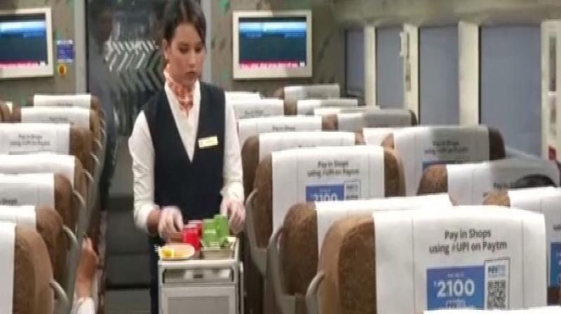 In a big step aimed at enhancing passengers' convenience, the IRCTC has brought 34 trained air hostesses and flight steward on Vande Bharat Express. (Photo: ANI) In a big step aimed at enhancing passengers' convenience, the IRCTC has brought 34 trained air hostesses and flight steward on Vande Bharat Express. (Photo: ANI)