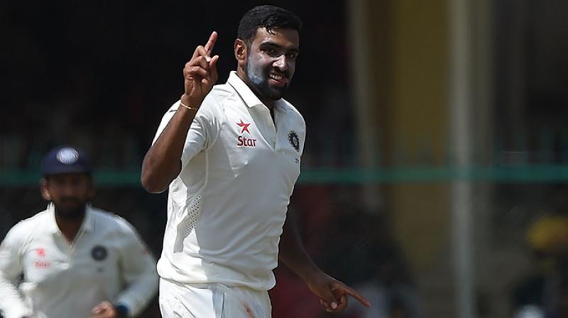 Playing in his 45th Test match, R Ashwin achieved the feat when he dismissed Bangladesh skipper Mushfiqur Rahim in the first session of the fourth and penultimate day of the one-off Test. (Photo: AFP) Playing in his 45th Test match, R Ashwin achieved the feat when he dismissed Bangladesh skipper Mushfiqur Rahim in the first session of the fourth and penultimate day of the one-off Test. (Photo: AFP)