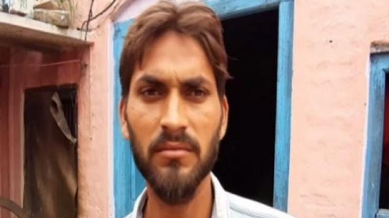 A video also went viral in which he can be seen along with others dressed like a Kanwariya. (Photo: ANI) A video also went viral in which he can be seen along with others dressed like a Kanwariya. (Photo: ANI)
