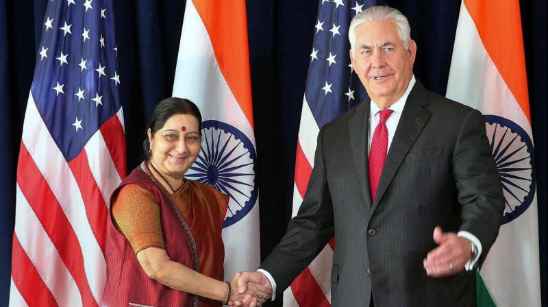 External Affairs Minister Sushma Swaraj and US Secretary of State Rex Tillerson, who met on the sidelines of UN General Assembly session, also discussed the Deferred Action for Childhood Arrivals (DACA) policy. (Photo: PTI) External Affairs Minister Sushma Swaraj and US Secretary of State Rex Tillerson, who met on the sidelines of UN General Assembly session, also discussed the Deferred Action for Childhood Arrivals (DACA) policy. (Photo: PTI)