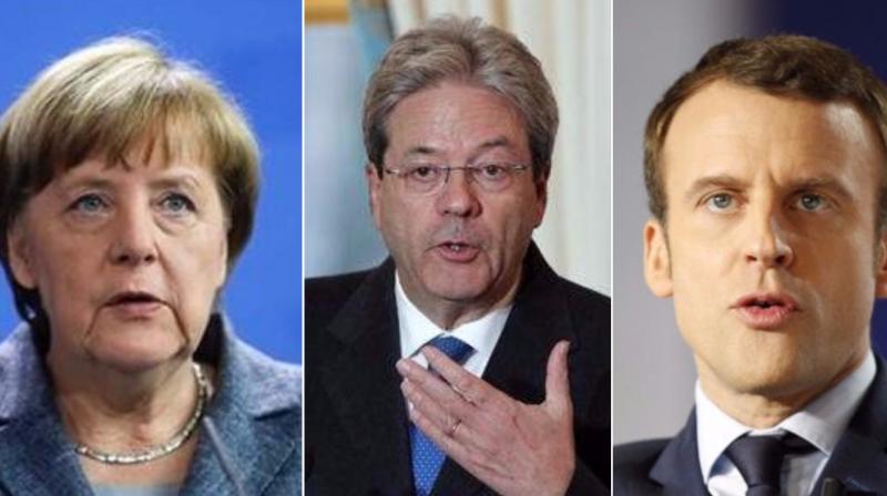 Italian Prime minister Paolo Gentiloni (center), German Chancellor Angela Merkel (left) and French President Emmanuel Macron (right) reaffirmed their strongest commitment to swiftly implement the Paris accord and urged all the other partner countries "to spead up their action to combat climate change." (Photo: AP) Italian Prime minister Paolo Gentiloni (center), German Chancellor Angela Merkel (left) and French President Emmanuel Macron (right) reaffirmed their strongest commitment to swiftly implement the Paris accord and urged all the other partner countries "to spead up their action to combat climate change." (Photo: AP)