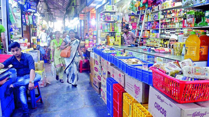 A deserted view of a wholesale market in Mumbai on Wednesday following the demonetization of `1000 and `500 notes. (Photo: AP) A deserted view of a wholesale market in Mumbai on Wednesday following the demonetization of `1000 and `500 notes. (Photo: AP)
