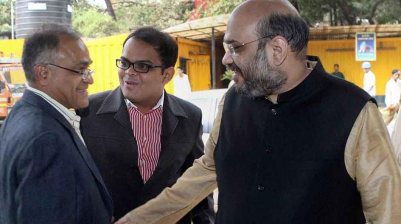The BJP leader further said that the article is written to damage the reputation of party president Amit Shah. In picture: Amit Shah (right) and his son Jay Shah (centre). (Photo: PTI) The BJP leader further said that the article is written to damage the reputation of party president Amit Shah. In picture: Amit Shah (right) and his son Jay Shah (centre). (Photo: PTI)