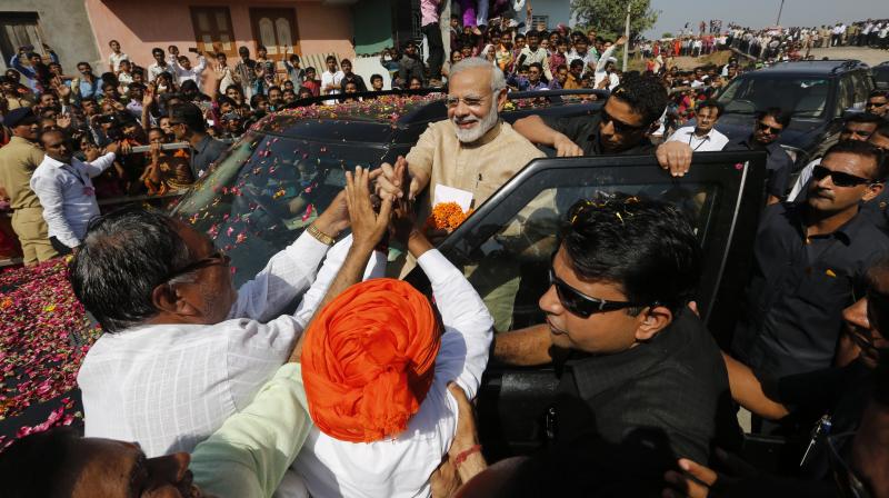 Narendra Modi, who once sold tea at the Vadnagar railway station, recalled his journey to Delhi from Gujarat where he was the chief minister for 13 years from 2001. (Photo: PTI) Narendra Modi, who once sold tea at the Vadnagar railway station, recalled his journey to Delhi from Gujarat where he was the chief minister for 13 years from 2001. (Photo: PTI)