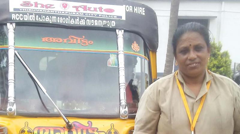 Seetha in front of her ‘She- auto’ Seetha in front of her ‘She- auto’