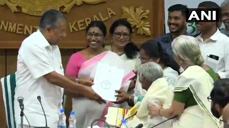 Karthiyani Amma, 96-year-old Kerala woman, who cleared test under state ‘Aksharalaksham’ literacy program scoring 98 out of 100 marks, was felicitated by CM Pinarayi Vijayan on Thursday. (Photo: Twitter | ANI) Karthiyani Amma, 96-year-old Kerala woman, who cleared test under state ‘Aksharalaksham’ literacy program scoring 98 out of 100 marks, was felicitated by CM Pinarayi Vijayan on Thursday. (Photo: Twitter | ANI)